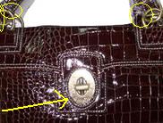 fake coach diaper bag hardware