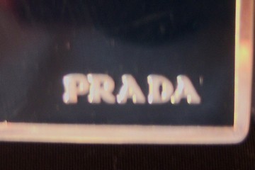 fake Prada belt logo