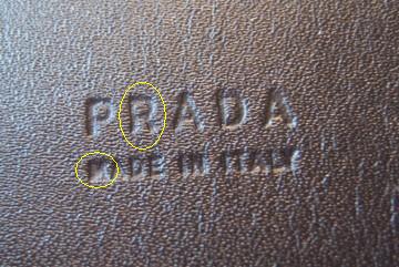 fake Prada belt logo